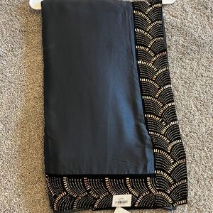 Dark gray saree with black velvet embroidered border and semi stitched blouse